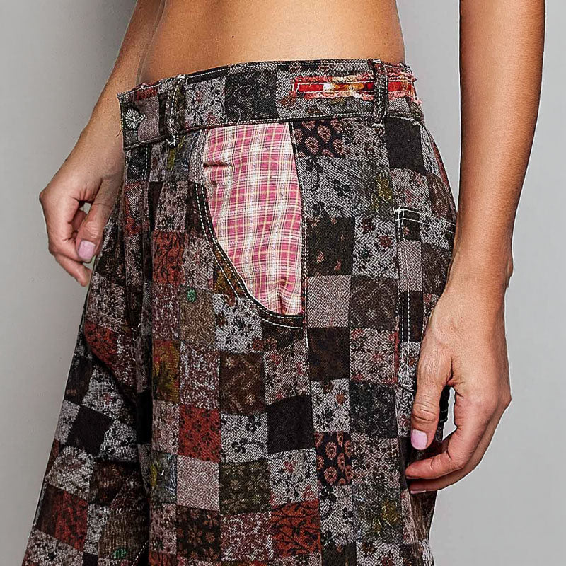 POL Clothing women's burgundy embroidered patchwork pants, side view showing relaxed full-length legs