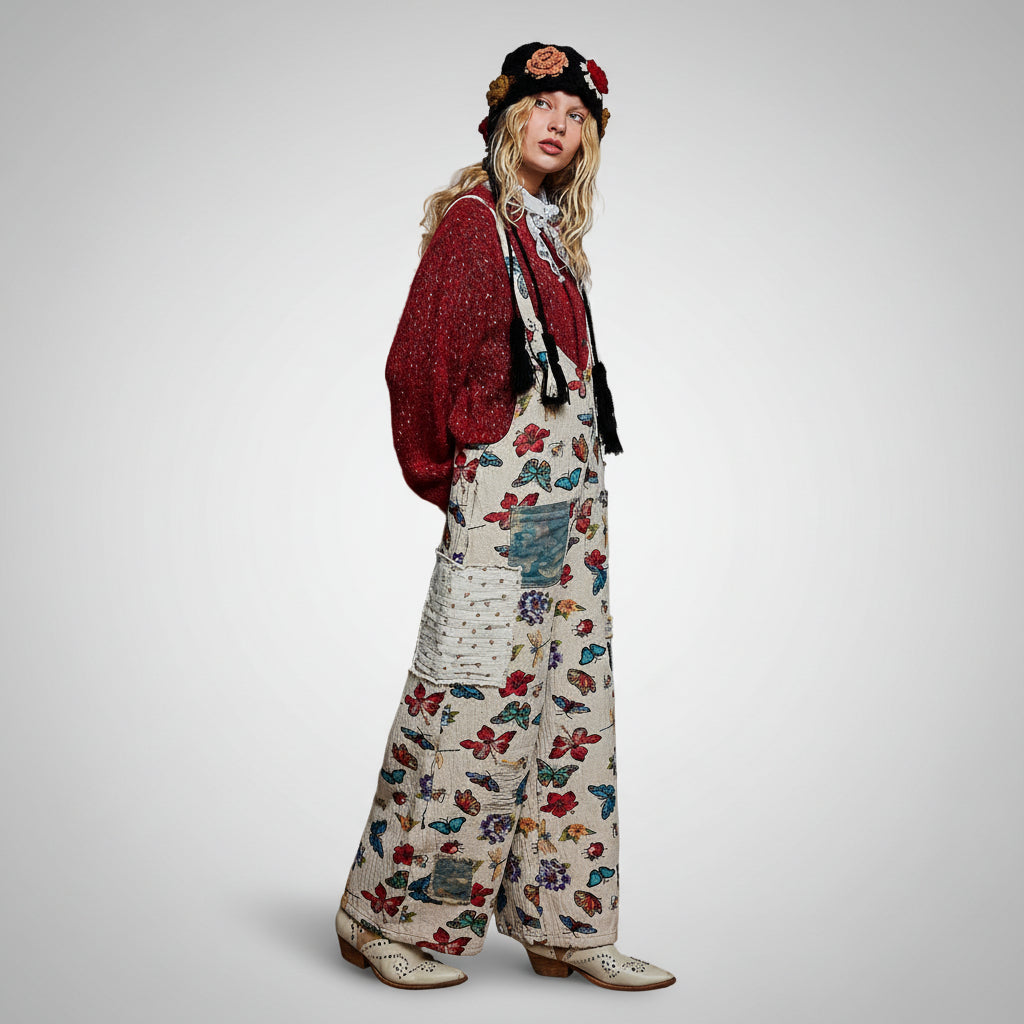 POL almond butterfly print overalls on model, side view showing wide-leg silhouette and mixed denim patch pocket
