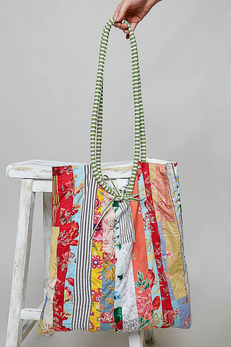 POL Clothing cream multi quilted patchwork tote bag on model full view
