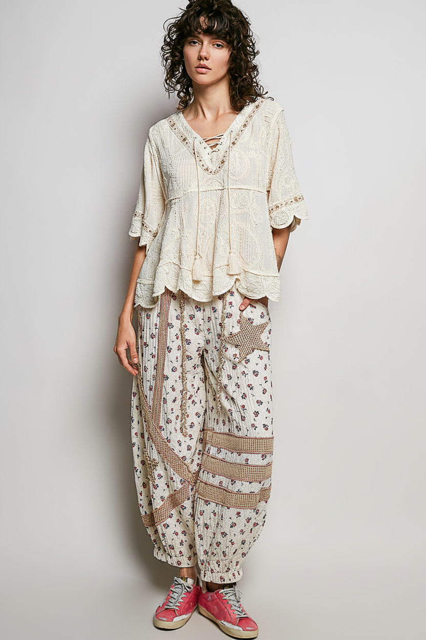 POL women's off white crochet lace-up blouse on model, front view showing lace-up neckline detail
