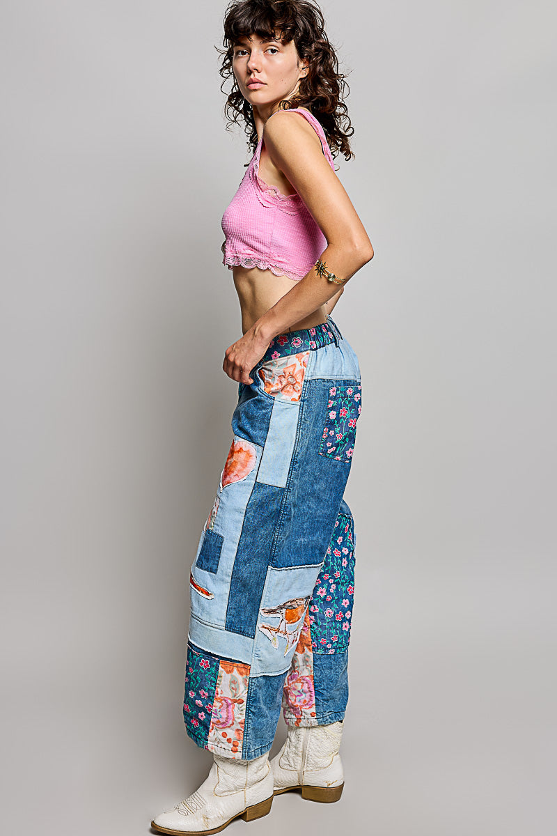 POL Clothing women's POL Patchwork Wide-Leg Denim Pants - Denim Multi paired with white cowboy boots at outdoor brunch