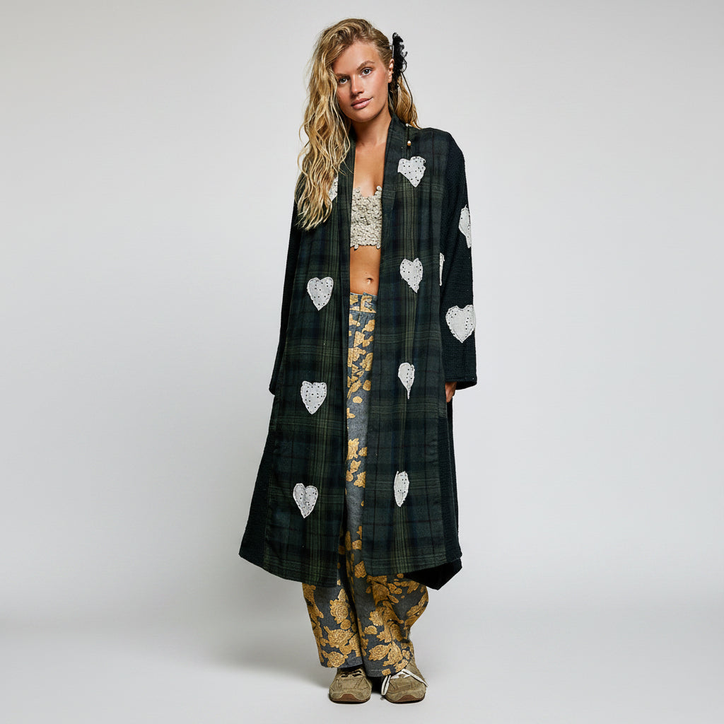 POL Clothing Natural Multi plaid patchwork longline coat on model, front view showing white eyelet lace heart detail and patch pockets
