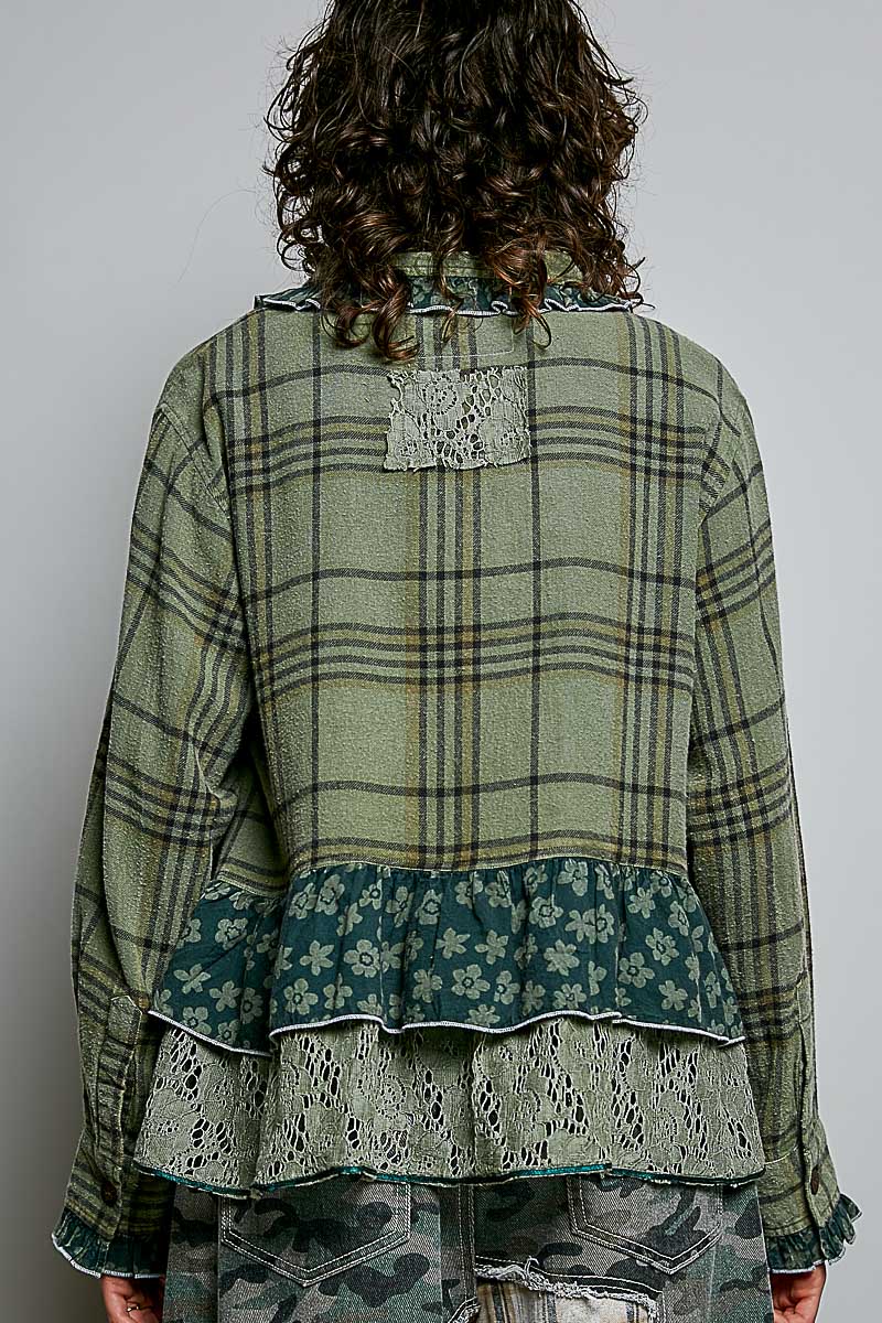 POL Clothing olive plaid button-up top on model, three-quarter side view showing sleeve and ruffle detail
