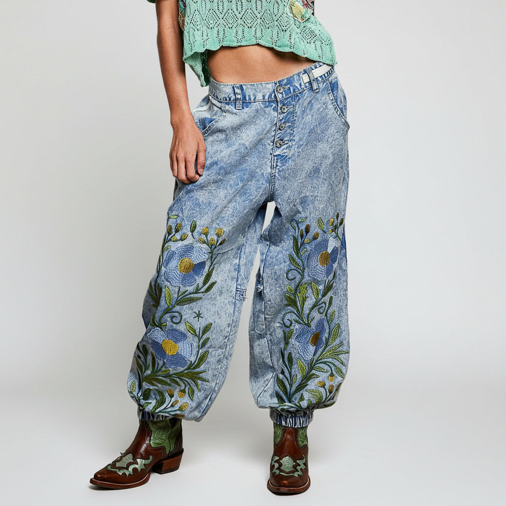 POL blue denim jogger pants, back view on model showing mineral wash finish and white side trim stripe
