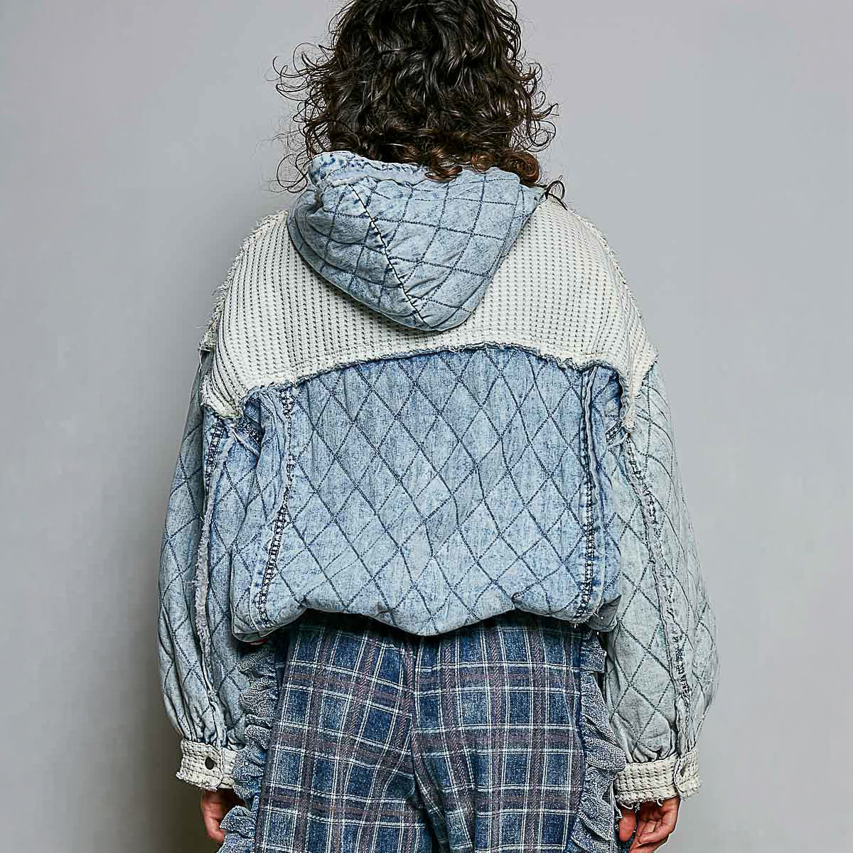 POL Clothing Denim Multi quilted thermal patch hoodie on model, back view showing cream waffle-knit yoke and quilted denim body

