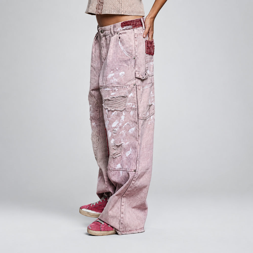 POL Clothing Cloud Pink wide-leg carpenter pants front view with burgundy patch and torn knees