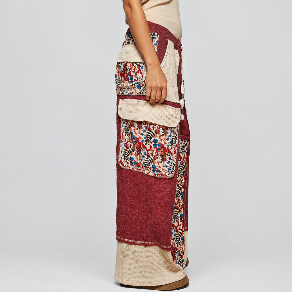 POL Clothing burgundy waffle knit wide-leg pants with drawstring waist and quilted floral panels, front
