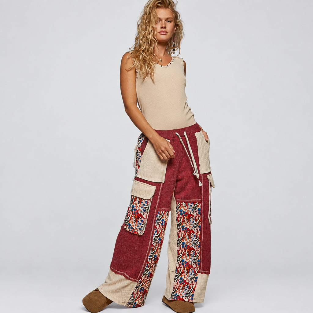 POL Clothing boho burgundy thermal wide-leg pants styled with a cream tank, full-length view