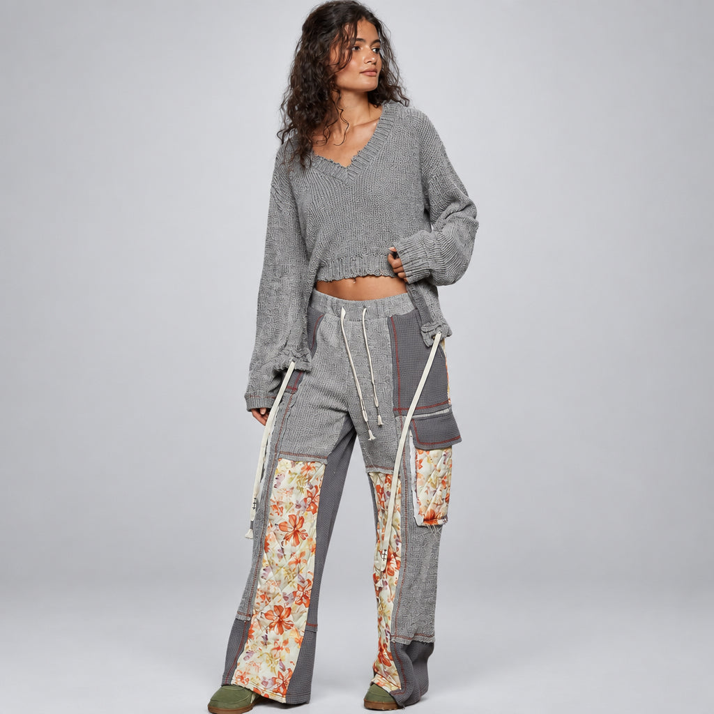 POL Clothing grey waffle knit wide-leg pants with quilted coral floral cargo pockets, back view