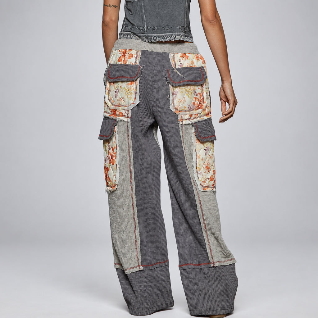 POL Clothing grey thermal wide-leg pants side view showing floral cargo pocket and relaxed leg