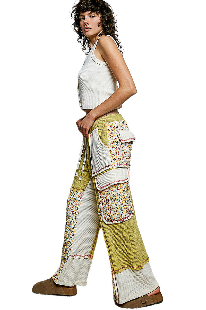POL Clothing lime green thermal wide-leg pants back view showing floral rear pockets and ivory panels