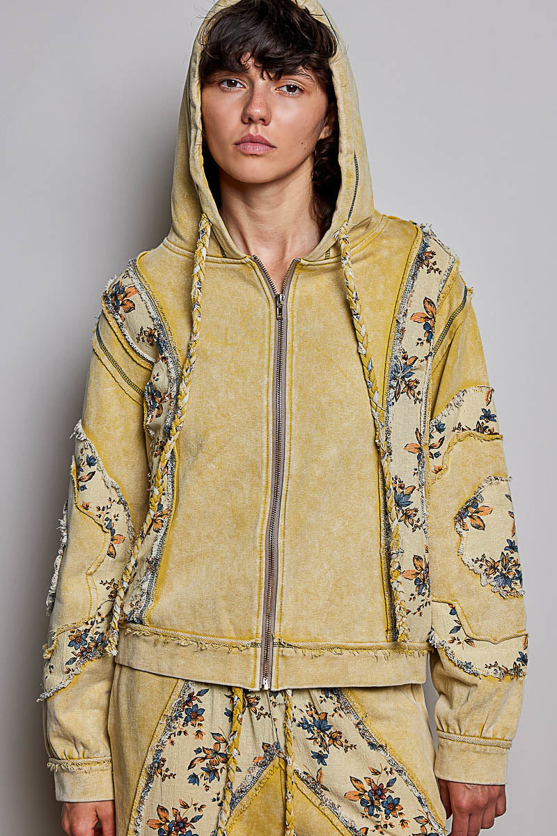 POL Clothing women's lemon floral patchwork zip-up hoodie close-up of hood, zipper and frayed shoulder seams