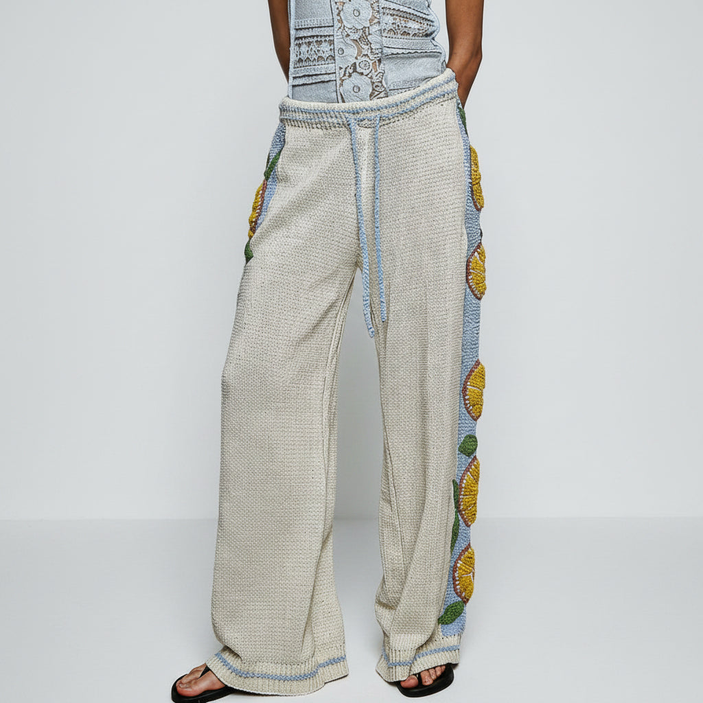 POL Clothing citrus embroidered wide leg knit lounge set styled indoors with boho decor