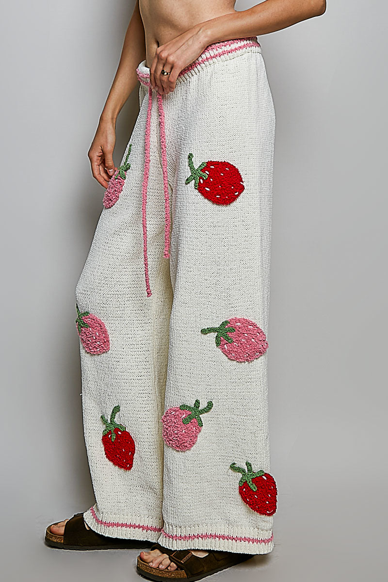 POL Clothing cream chenille strawberry patch wide-leg pants, side view on model showing full leg silhouette
