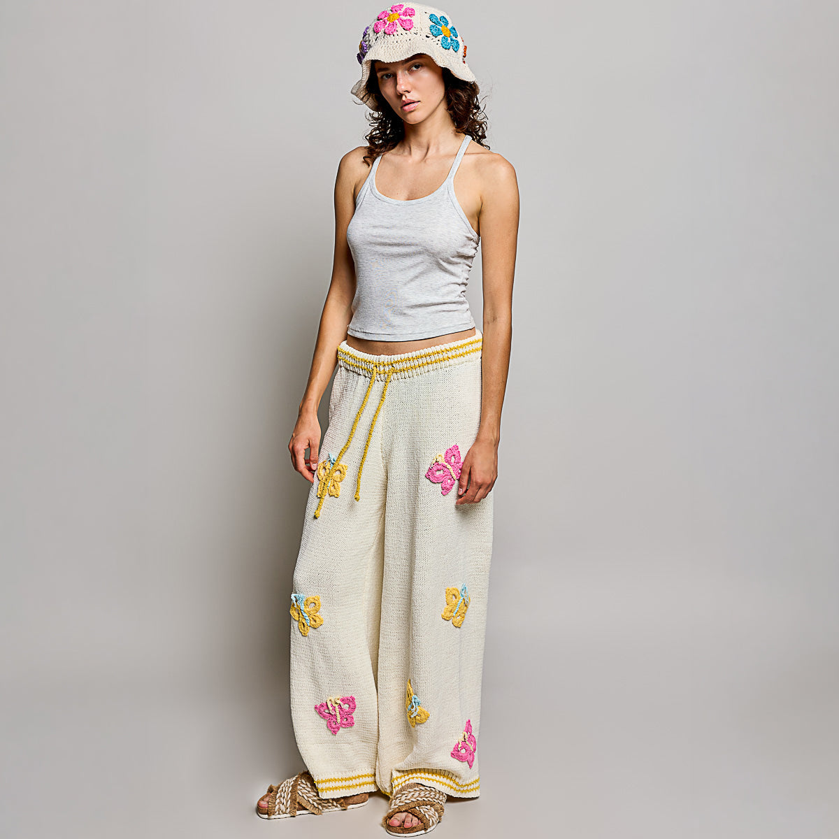 POL Clothing cream multi crochet butterfly wide leg knit pants styled with matching butterfly knit sweater, full set view
