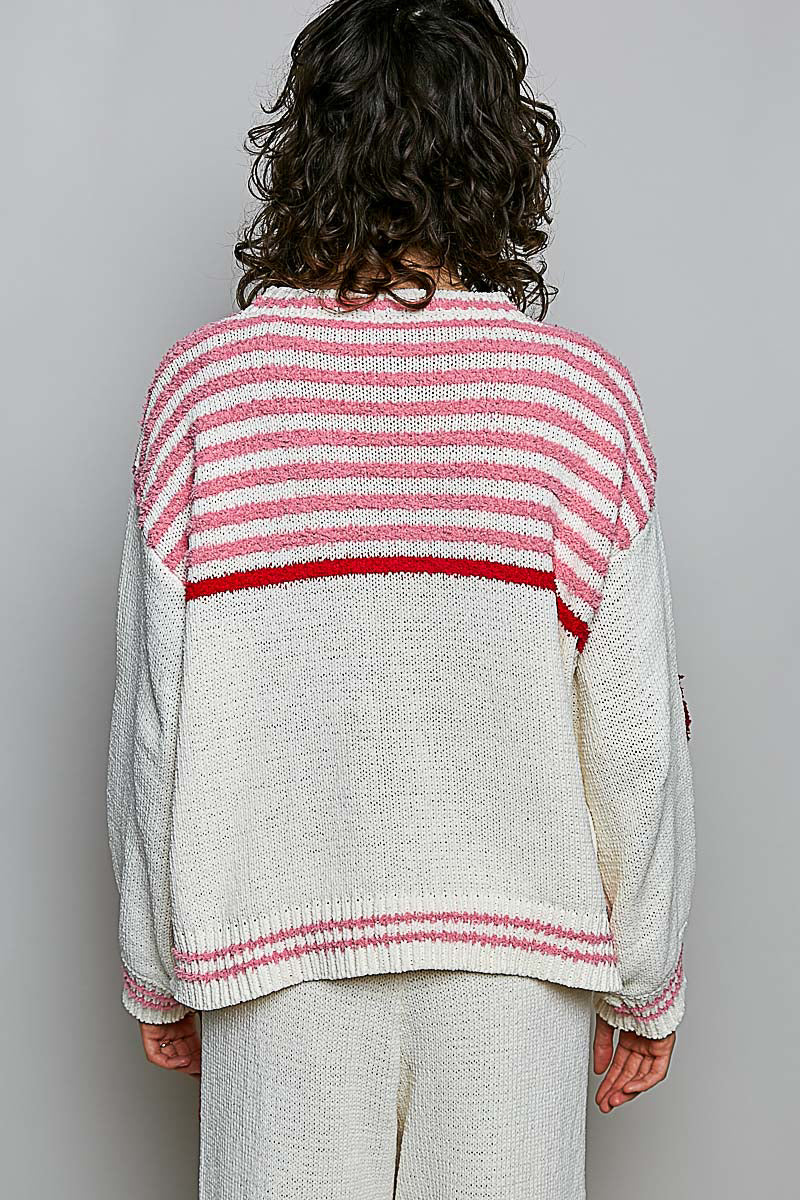 POL Clothing women's cream strawberry applique knit sweater, on model, seated pose showing full sweater - BellanBlue
