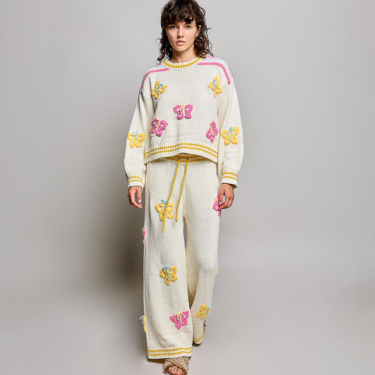 POL Clothing cream multi 3D butterfly chenille sweater top with matching wide-leg pants, full-length front view on model
