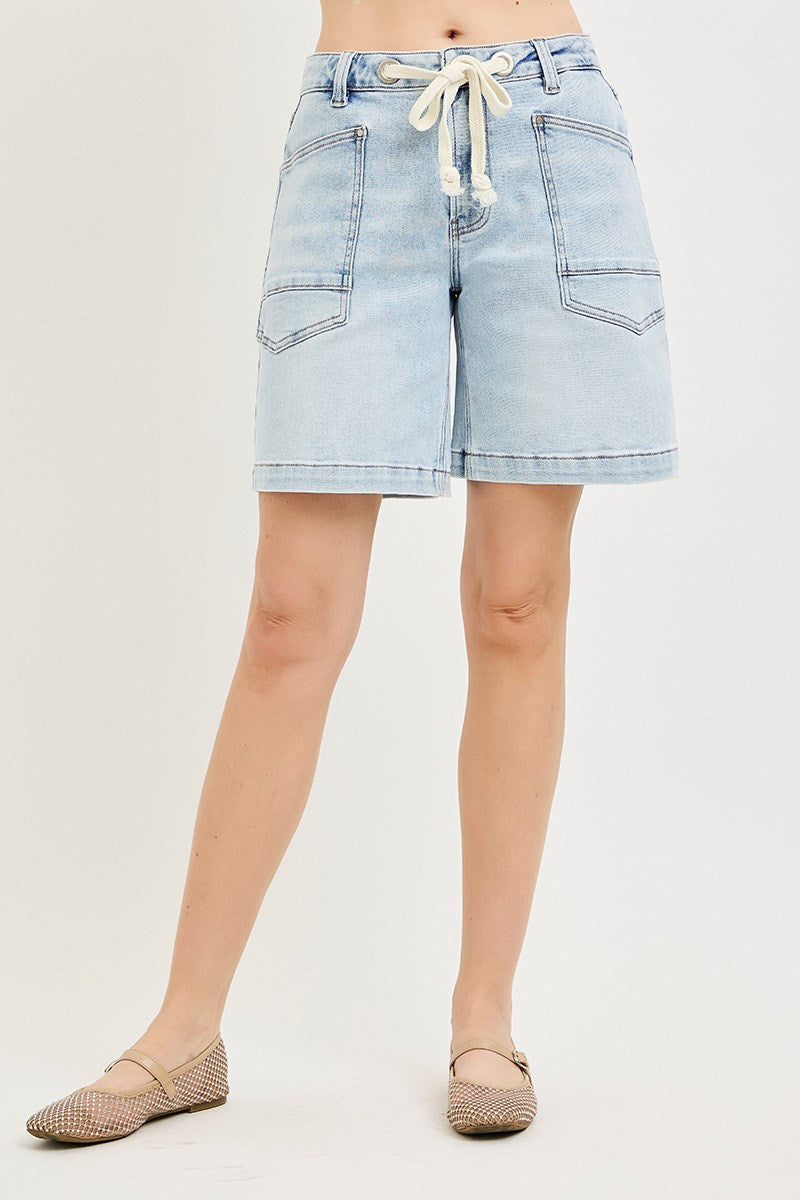 Risen Jeans Women's Light-Wash Drawstring Eyelet Slouchy Jorts showing back view with high-rise waist and clean knee hem.