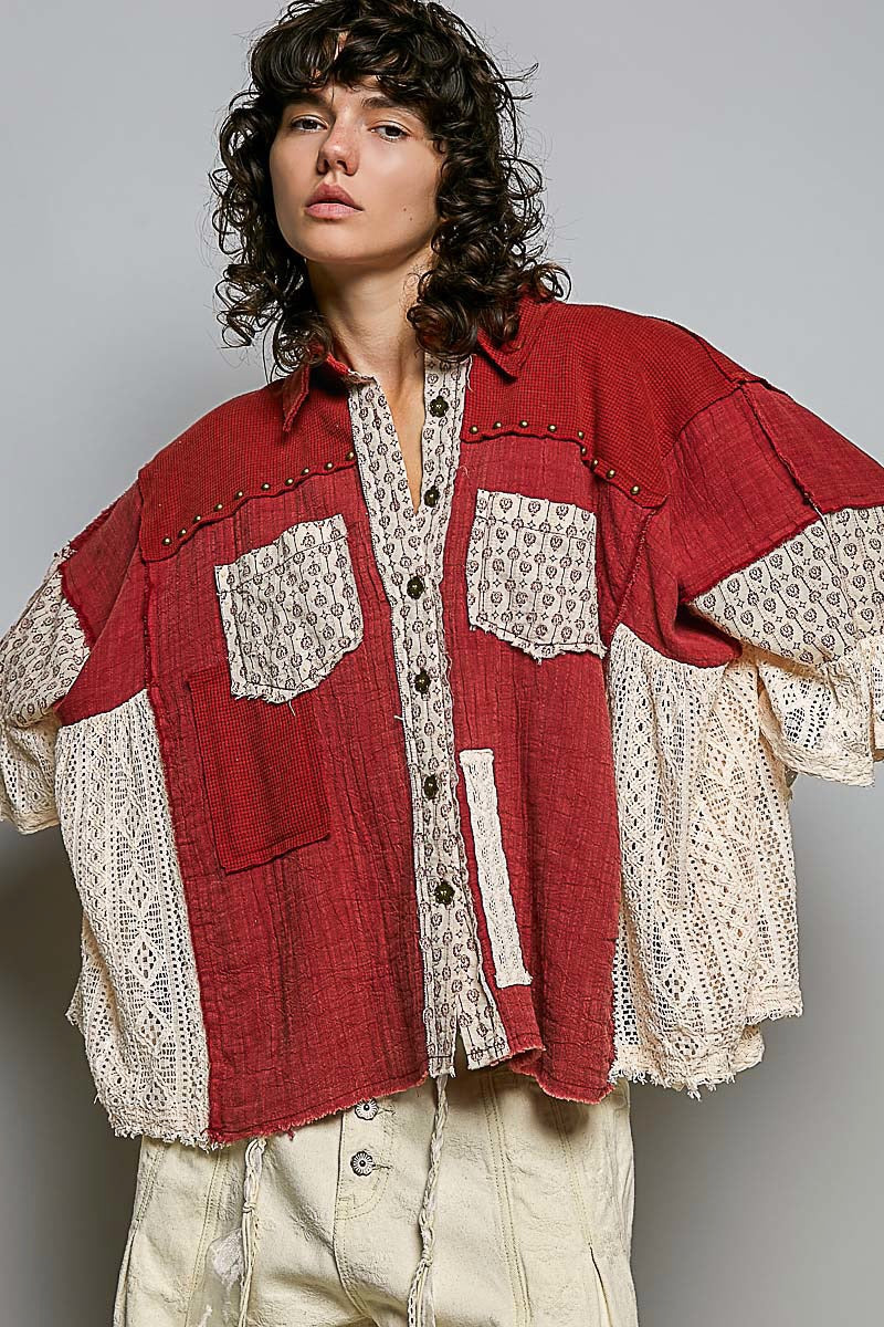 POL Clothing ruby red lace shirt side profile showing cream crochet side panel and sleeve
