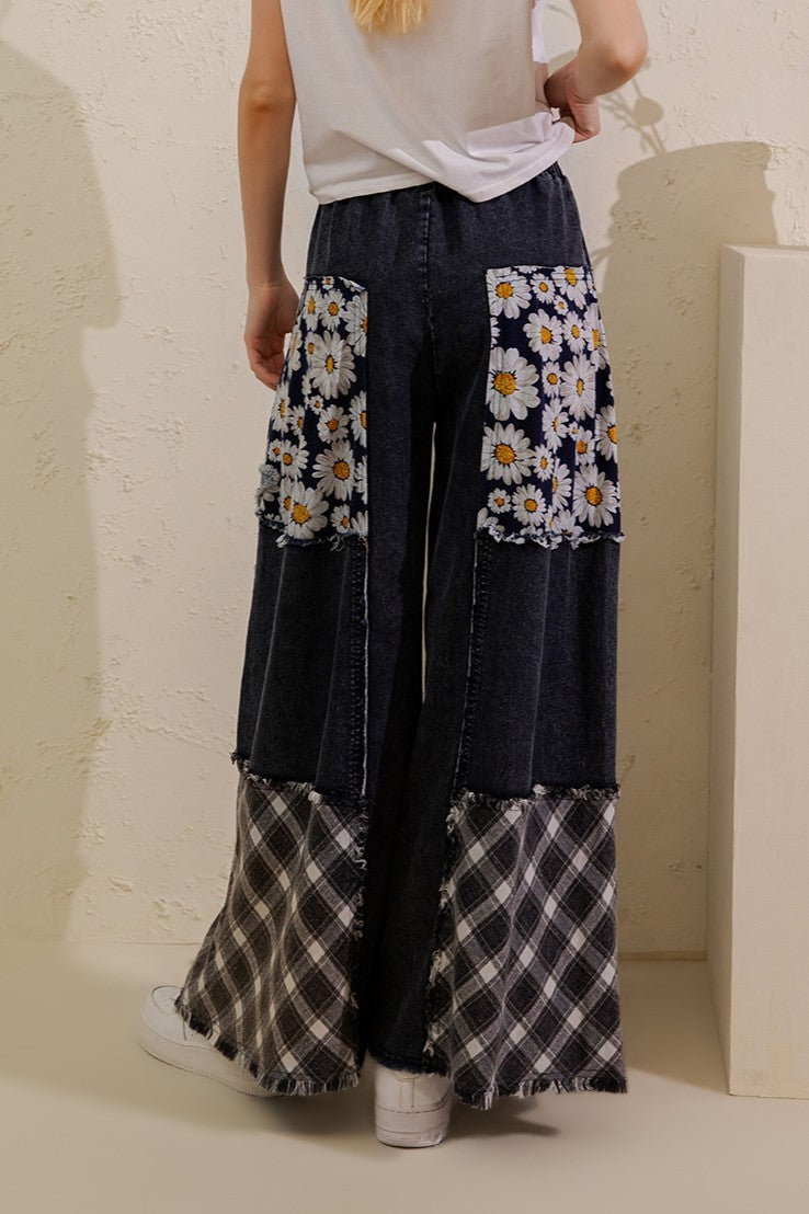 Sage + Fig women's denim star and daisy patchwork pants, back view with plaid wide-leg hems