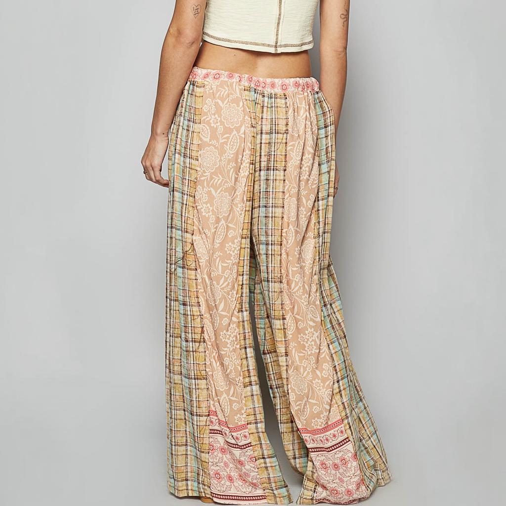 POL Clothing women's mocha floral and plaid wide-leg pants, rear view with pink floral hem borders

