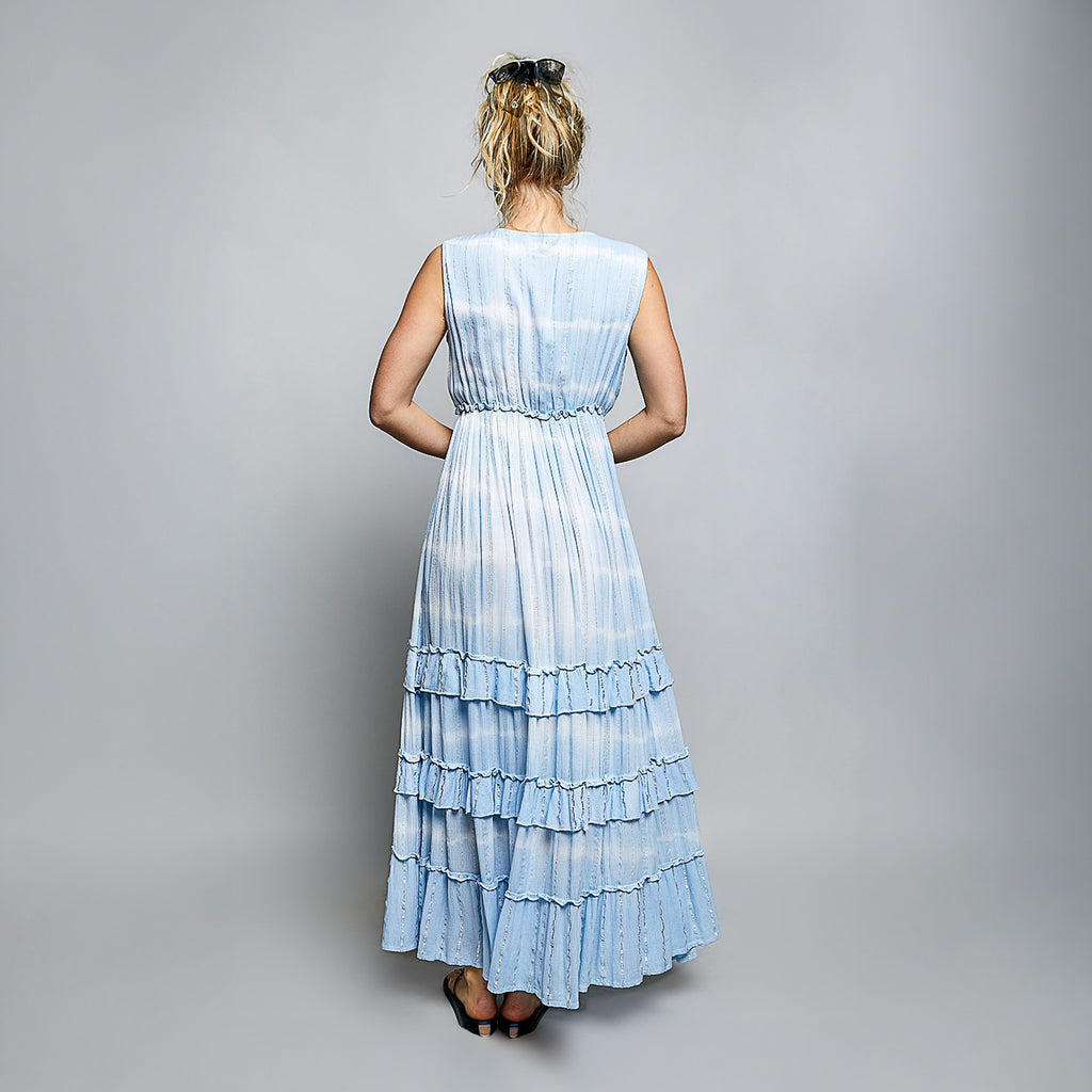 POL Clothing women's sky blue tiered ruffle maxi dress, back view studio, sleeveless silhouette
