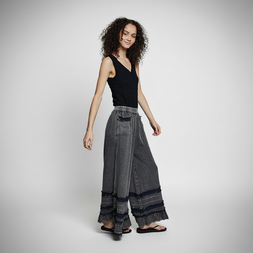 Women's charcoal wide-leg ruffle hem pants with elastic waist, relaxed fit, side or back angle view
