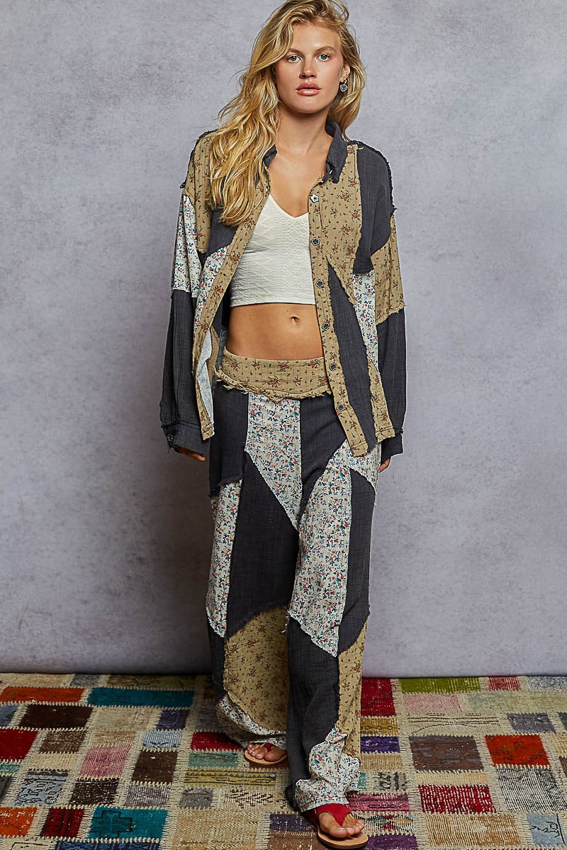 Woman wearing a patterned outfit against a plain background