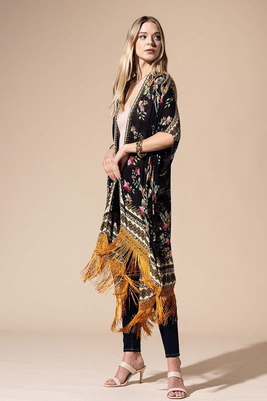 a woman wearing a black and yellow dress