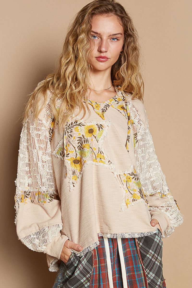 Women's beige relaxed fit balloon sleeve knit top with star patch styled for a casual fall outfit