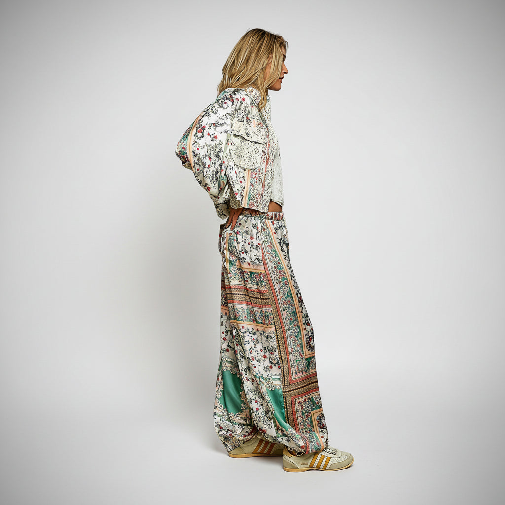 Women's blue multi printed patchwork paisley wide-leg pants with lace trim cuffs and elastic drawstring waist