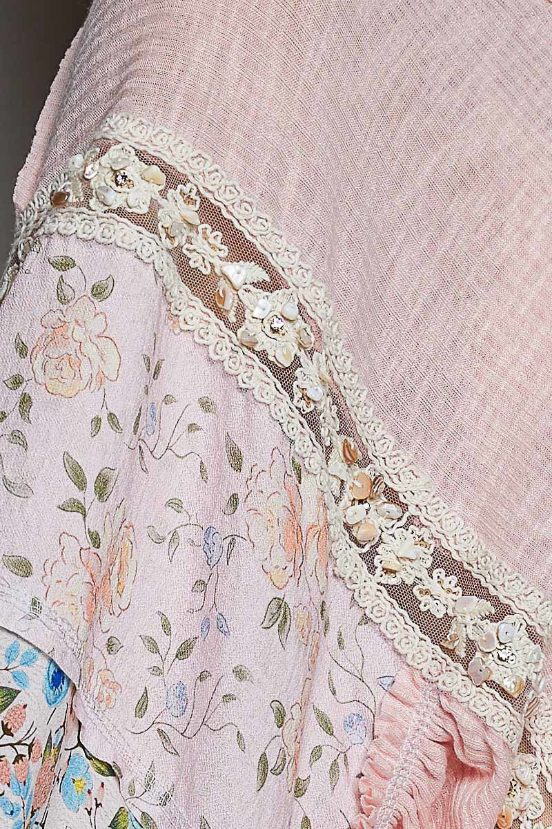 Close-up of a floral embroidered fabric with intricate details