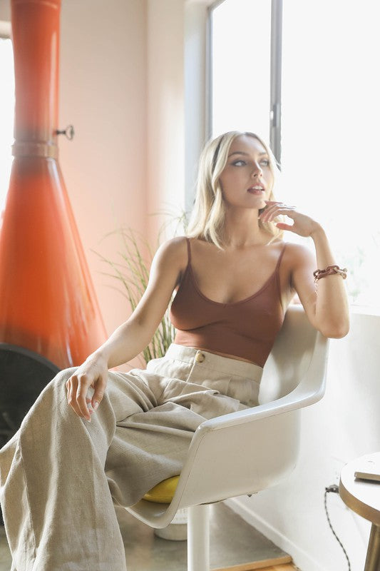 a woman sitting in a chair in a room