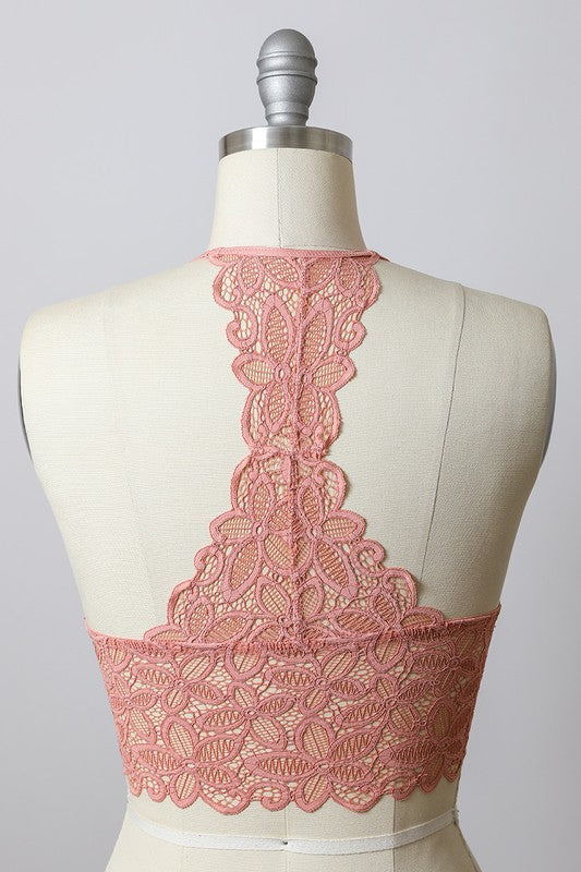 a dress on a mannequin with pink lace