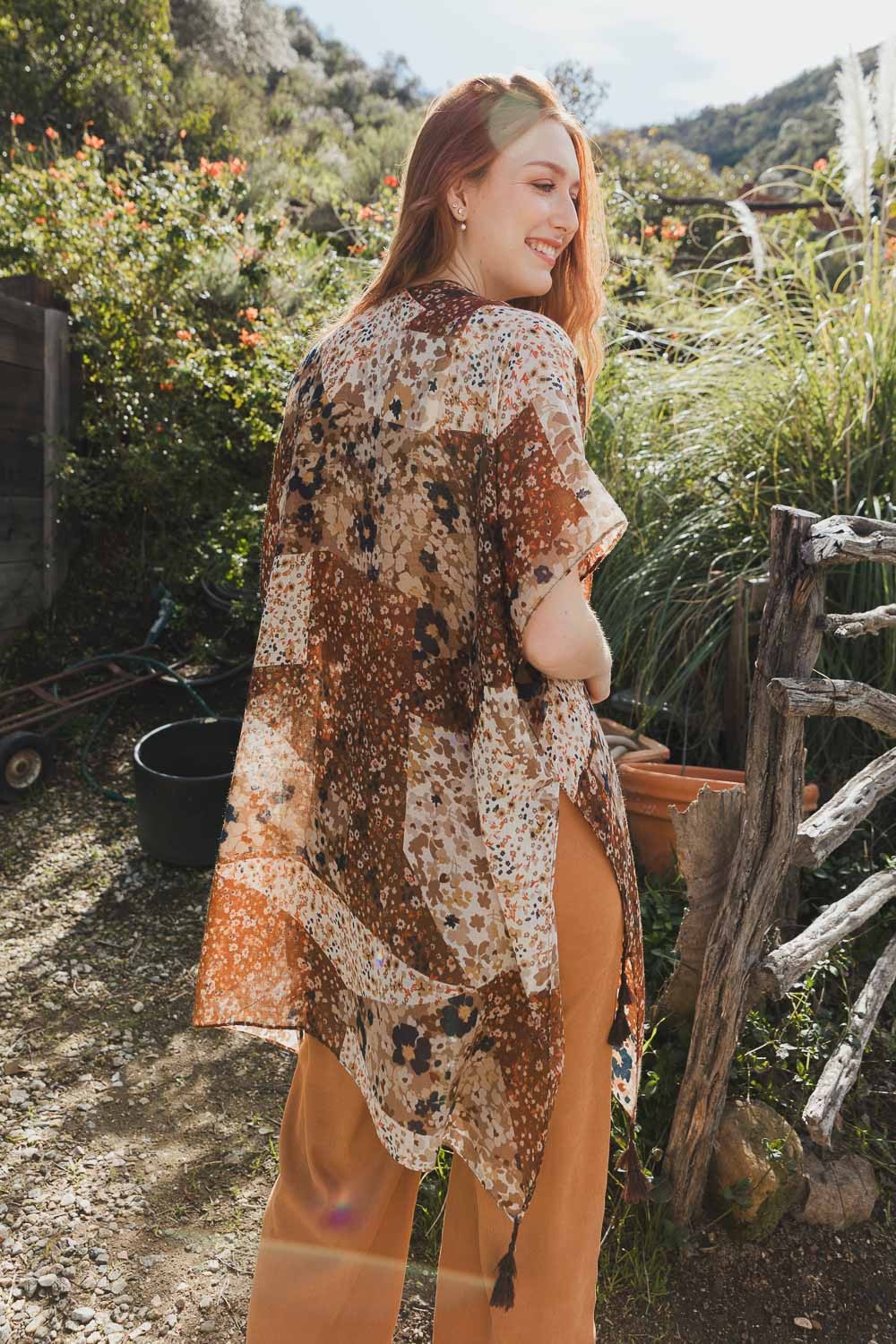 Women's floral print kimono in brown, open-front silhouette, full-length front view