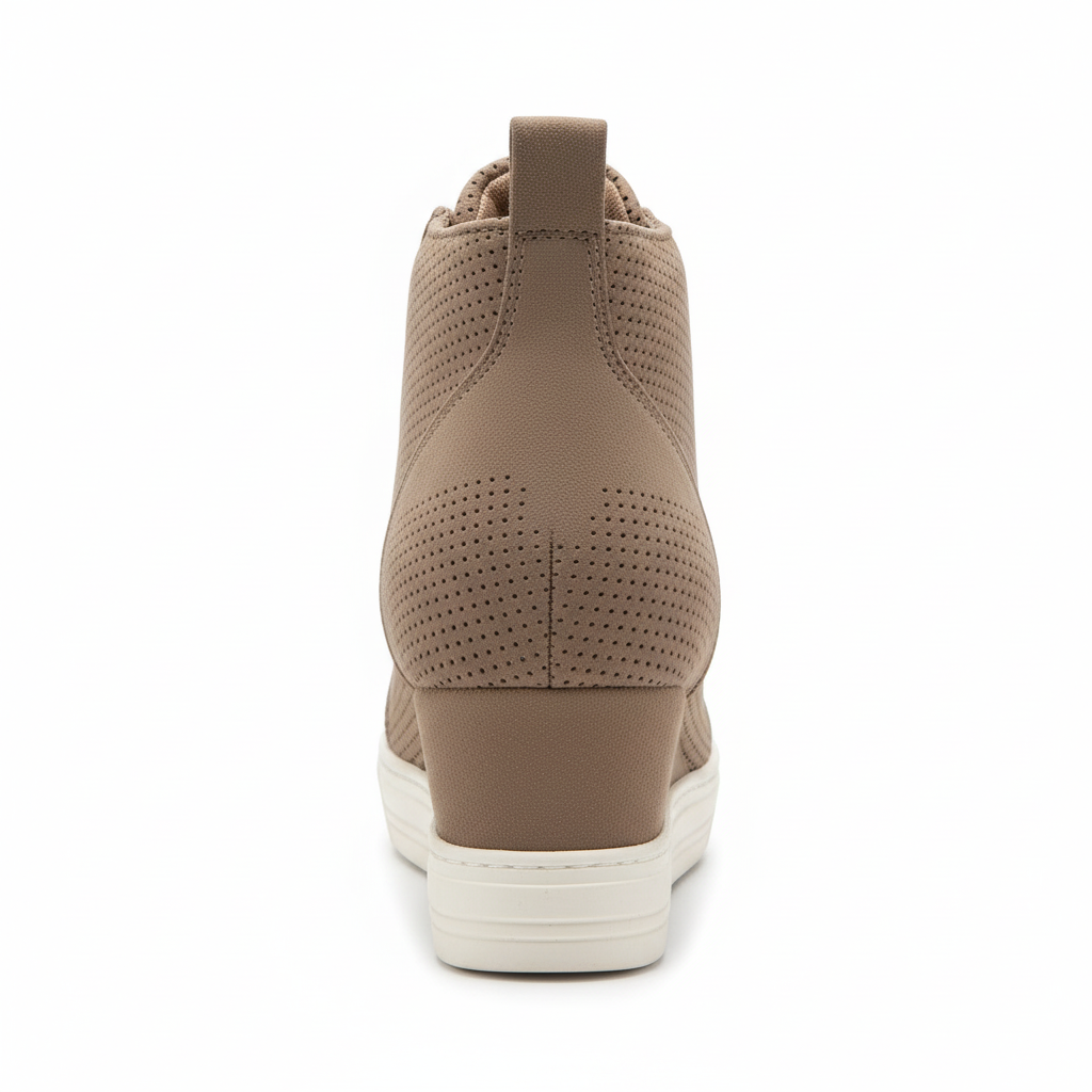 Brown sneaker with a white sole on a white background