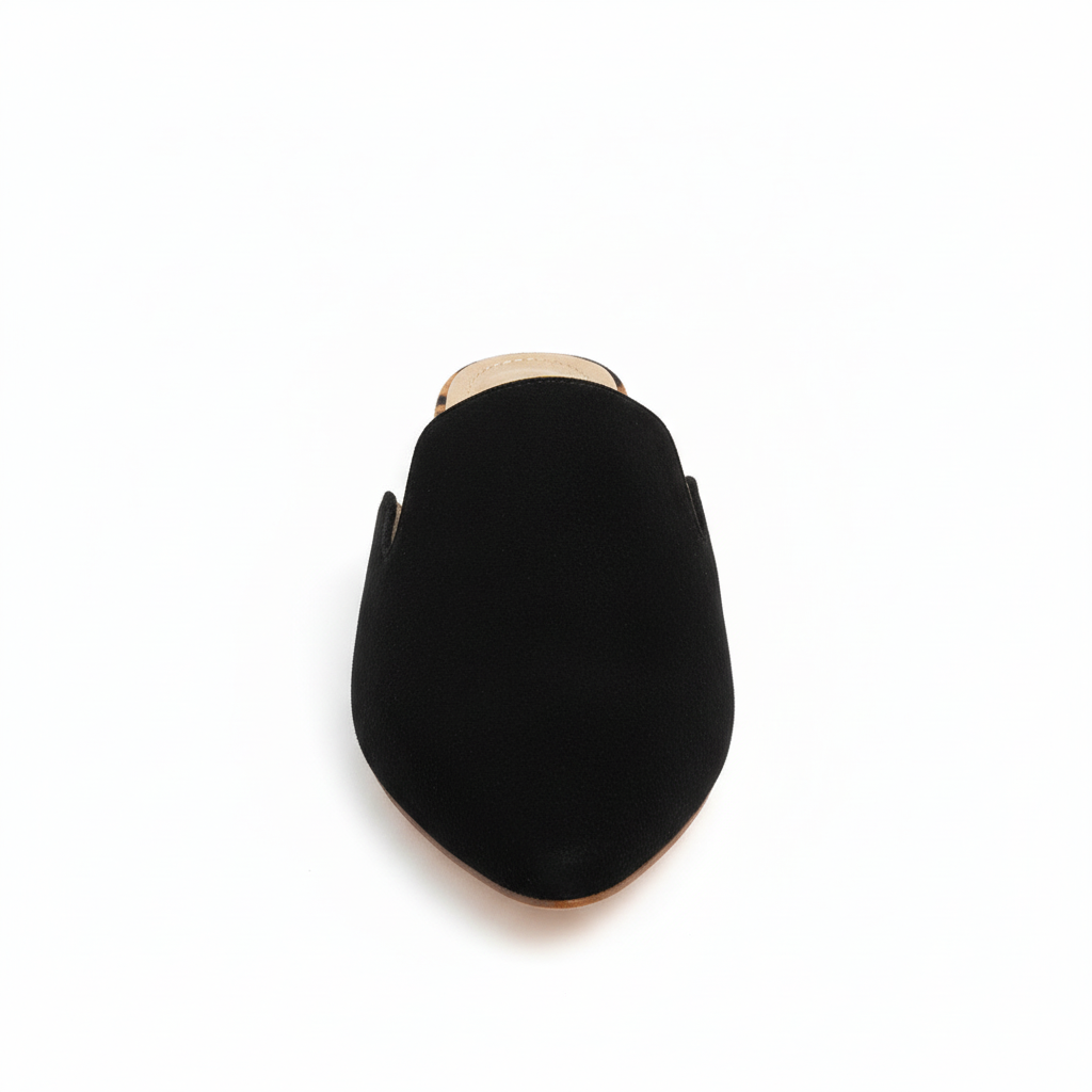 Black shoe with gold trim on a white background