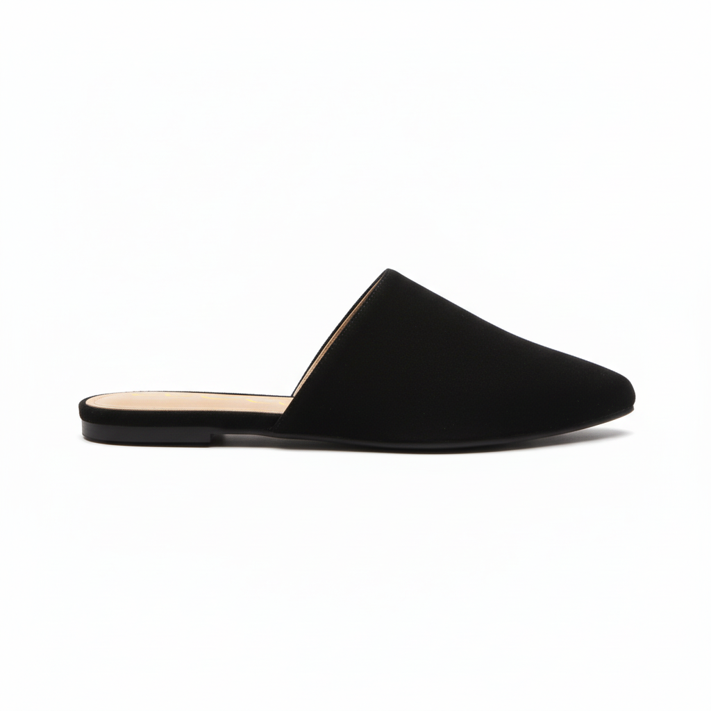 Black slip-on shoe on a white background