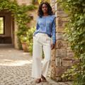 Zenana Women's Ocean Blue Acid Wash French Terry Henley Top paired with relaxed wide leg trousers for a casual outfit