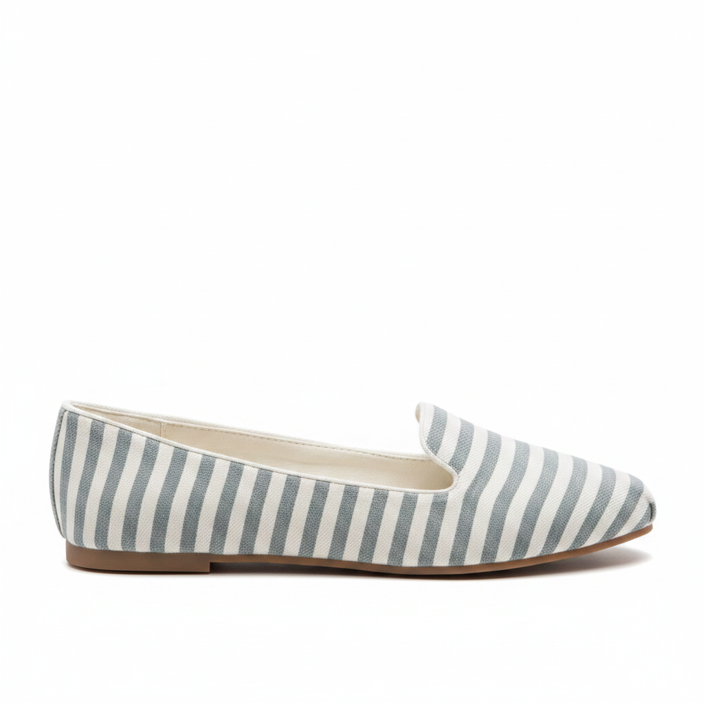 Grey and white stripe slip-on flat, side profile view showing flat sole and slip-on silhouette on white background