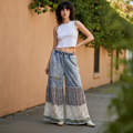 POL women's denim multi patchwork wide-leg pants styled with white crop top on boutique street - BellanBlue