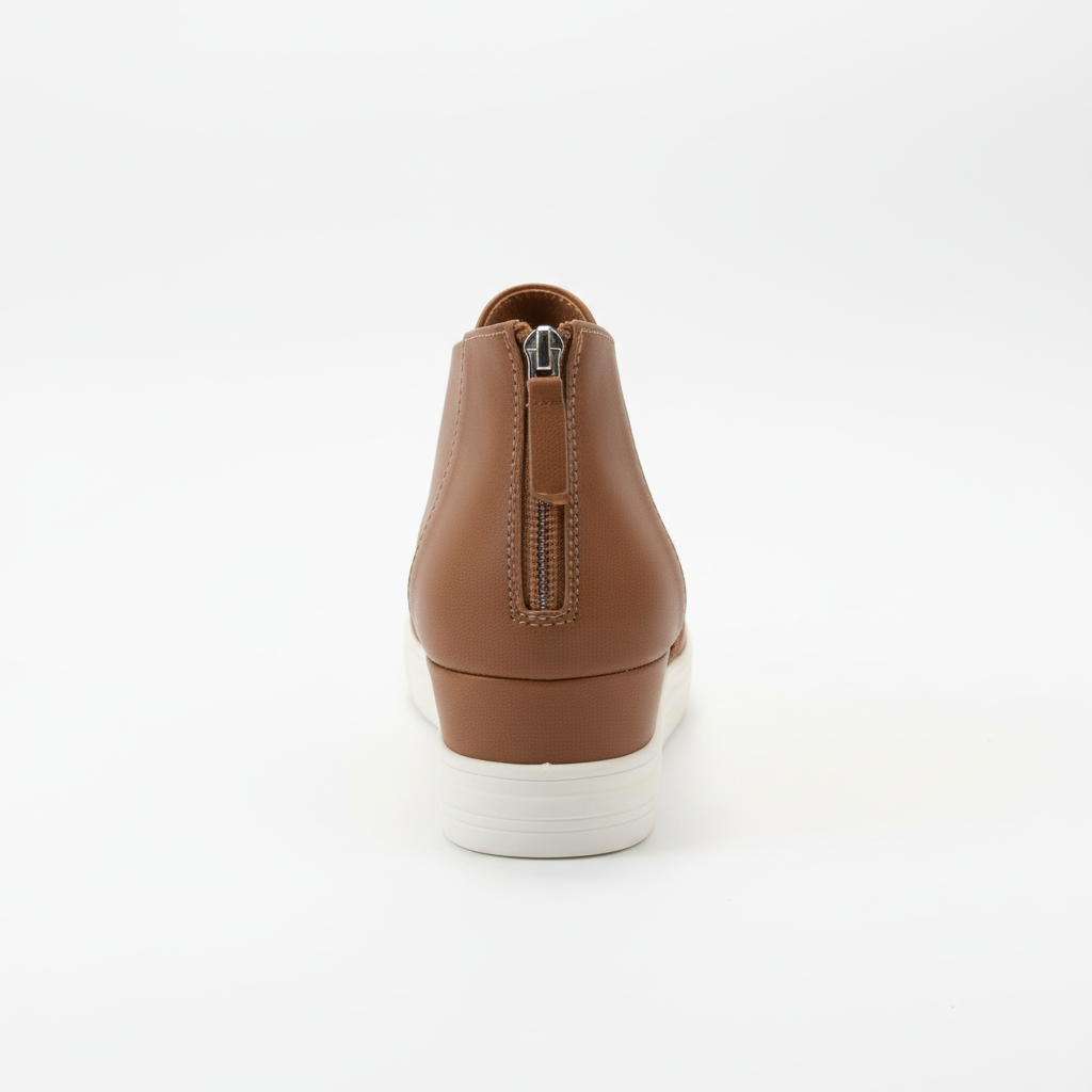 Tan crossover strap sneaker back view