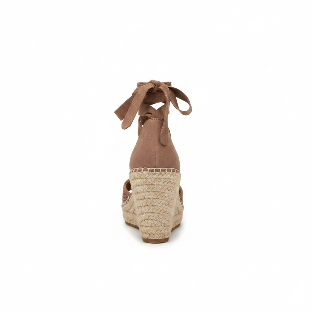 Taupe perforated suede espadrille wedge sandal, straight rear view showing suede heel counter and tall braided jute wedge