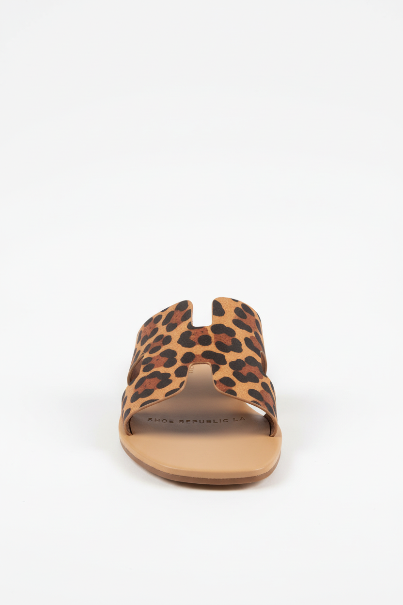 Women's leopard print slide sandal front view showing open toe design