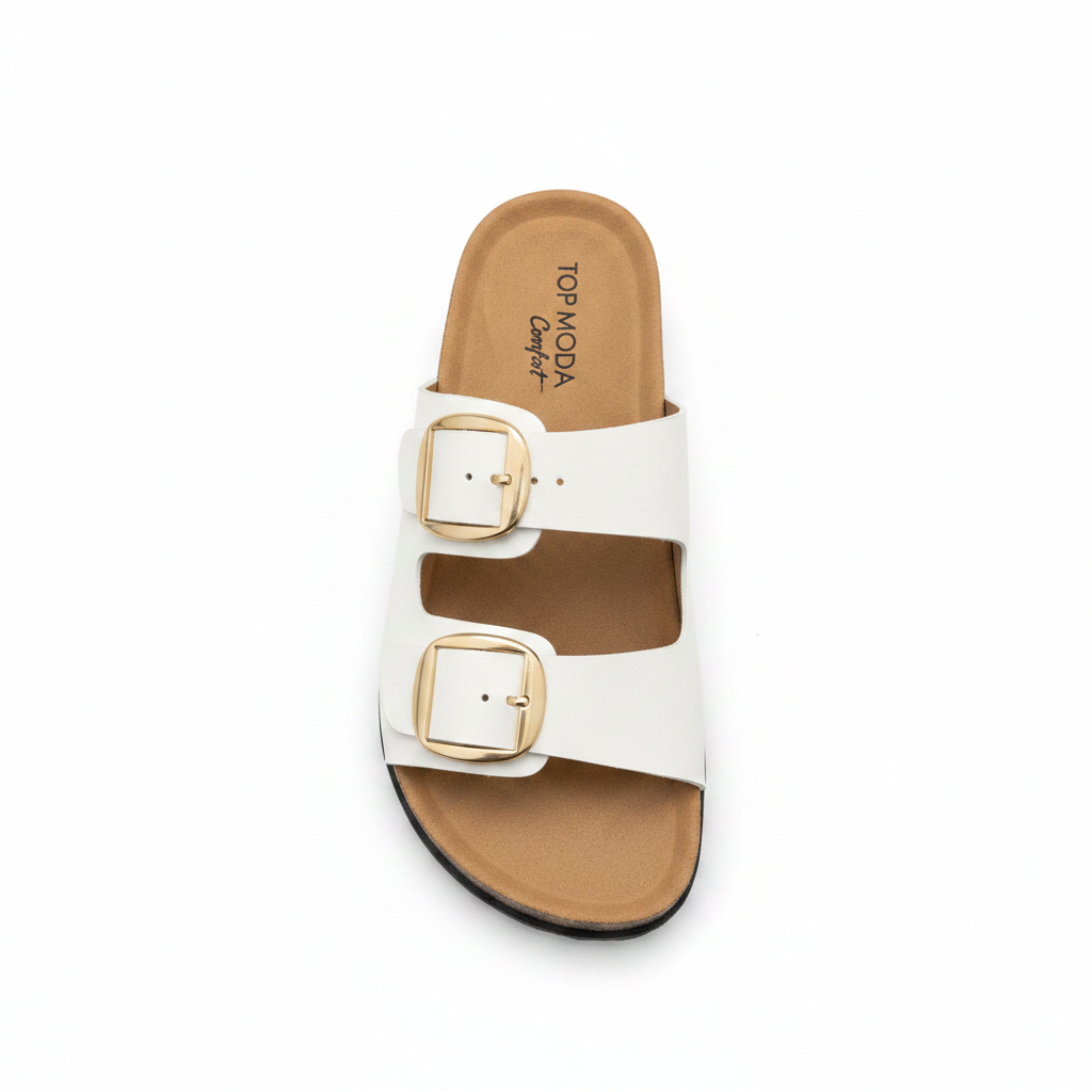 Women's white double buckle slide sandal, top-down view showing two wide straps with gold square hardware and tan cork footbed, white background