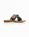 Side profile of tropical print slide sandals showing twisted knot height and comfortable flat silhouette