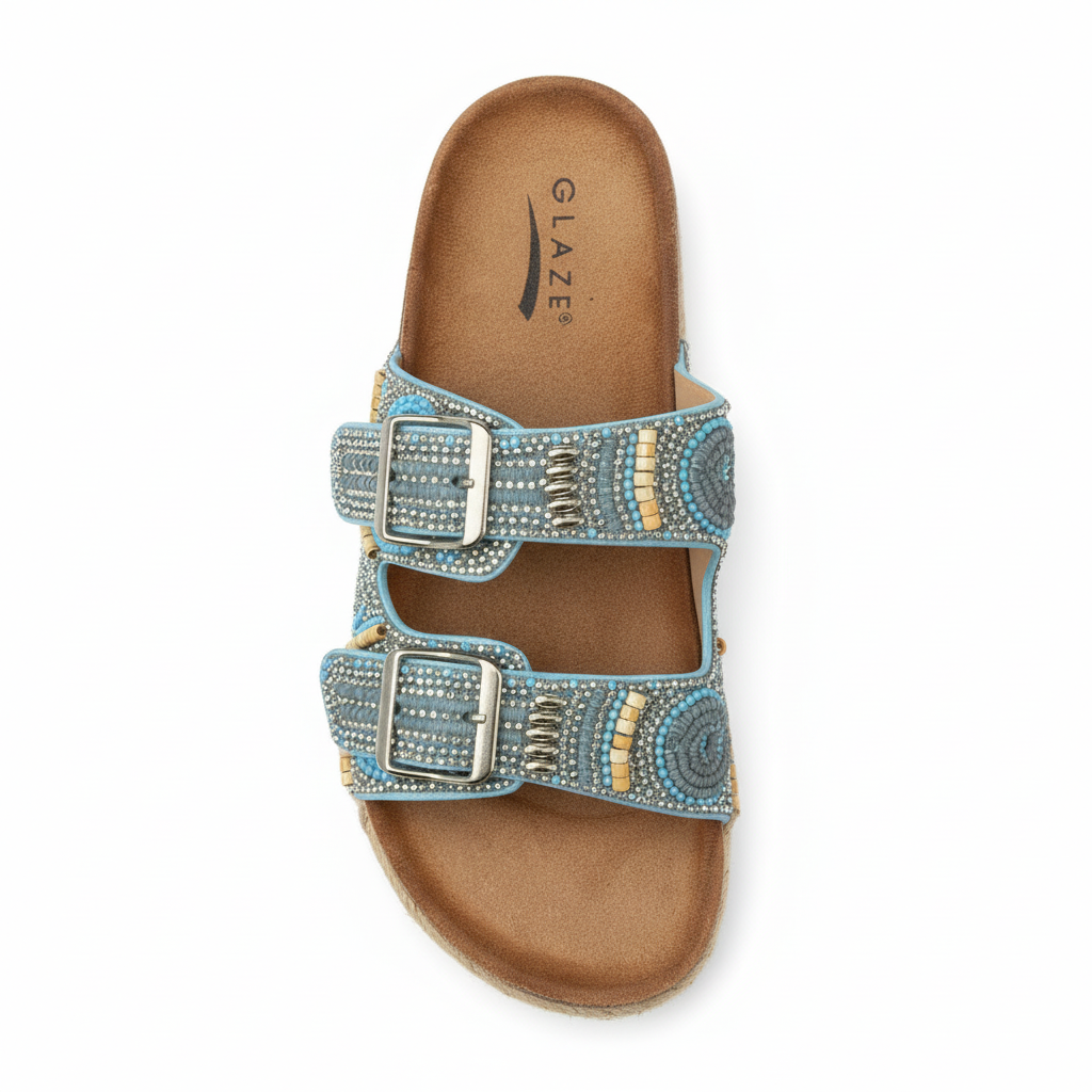 Blue embellished espadrille sandal top view showing cushioned insole and ornate rhinestone strap details