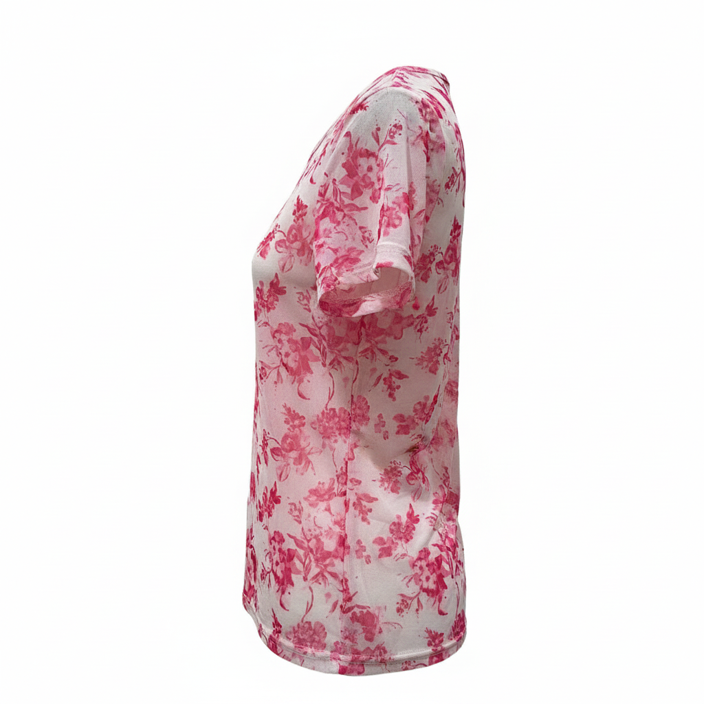 White t-shirt with pink floral pattern on a white background