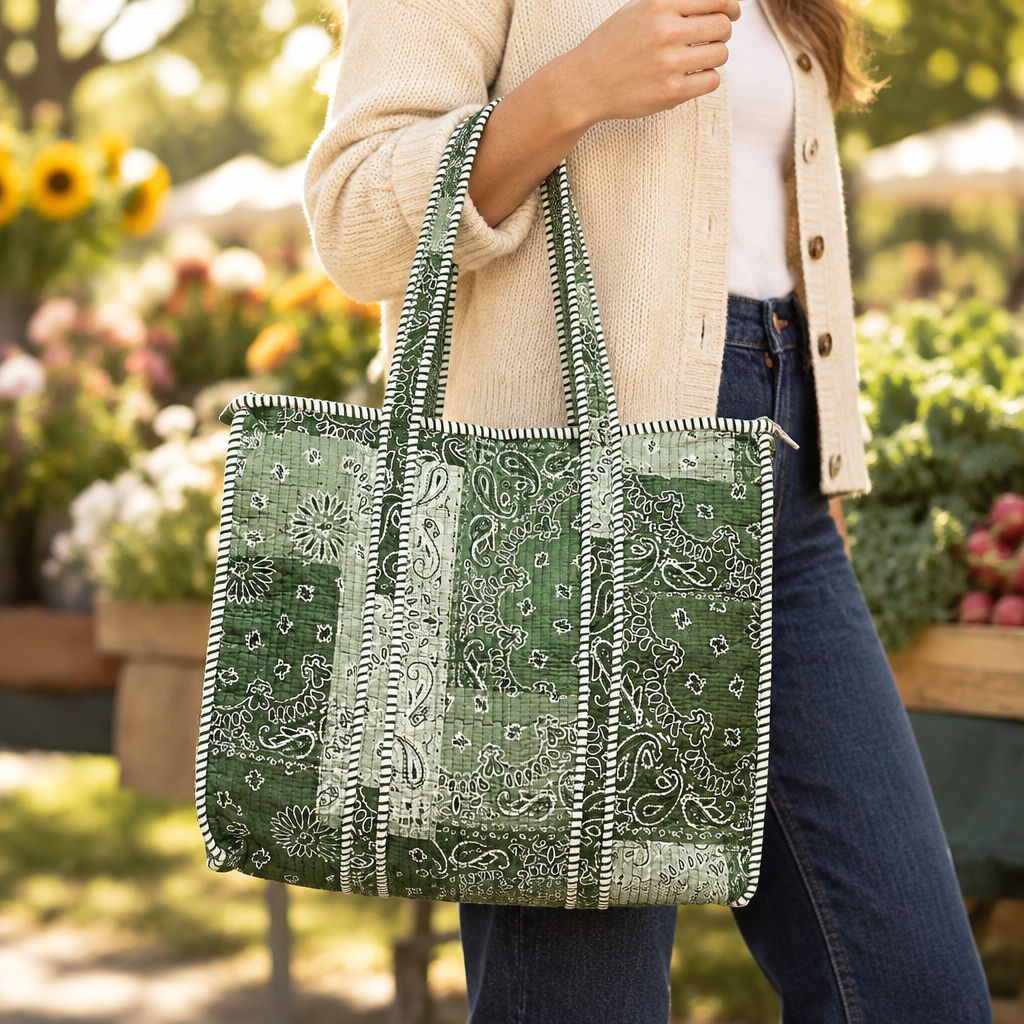 POL Clothing women's Green Multi paisley tote with striped trim, shown at an outdoor market