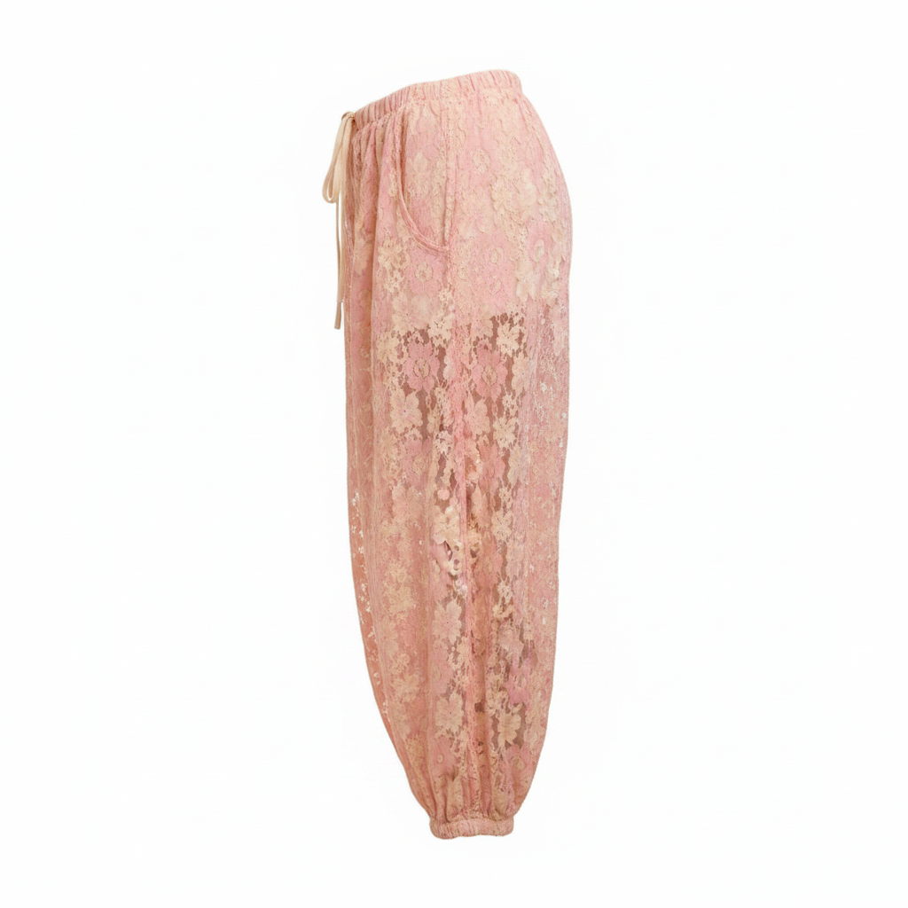 Women's blush lace balloon pants side profile, dramatic balloon silhouette, floral lace fabric, pull-on fit